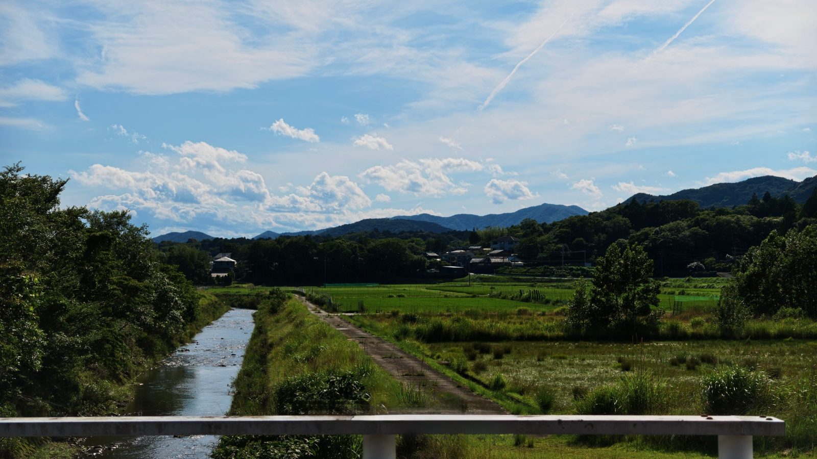 Rice fields and a small river below the mountains of inland Ise-Shima in summer